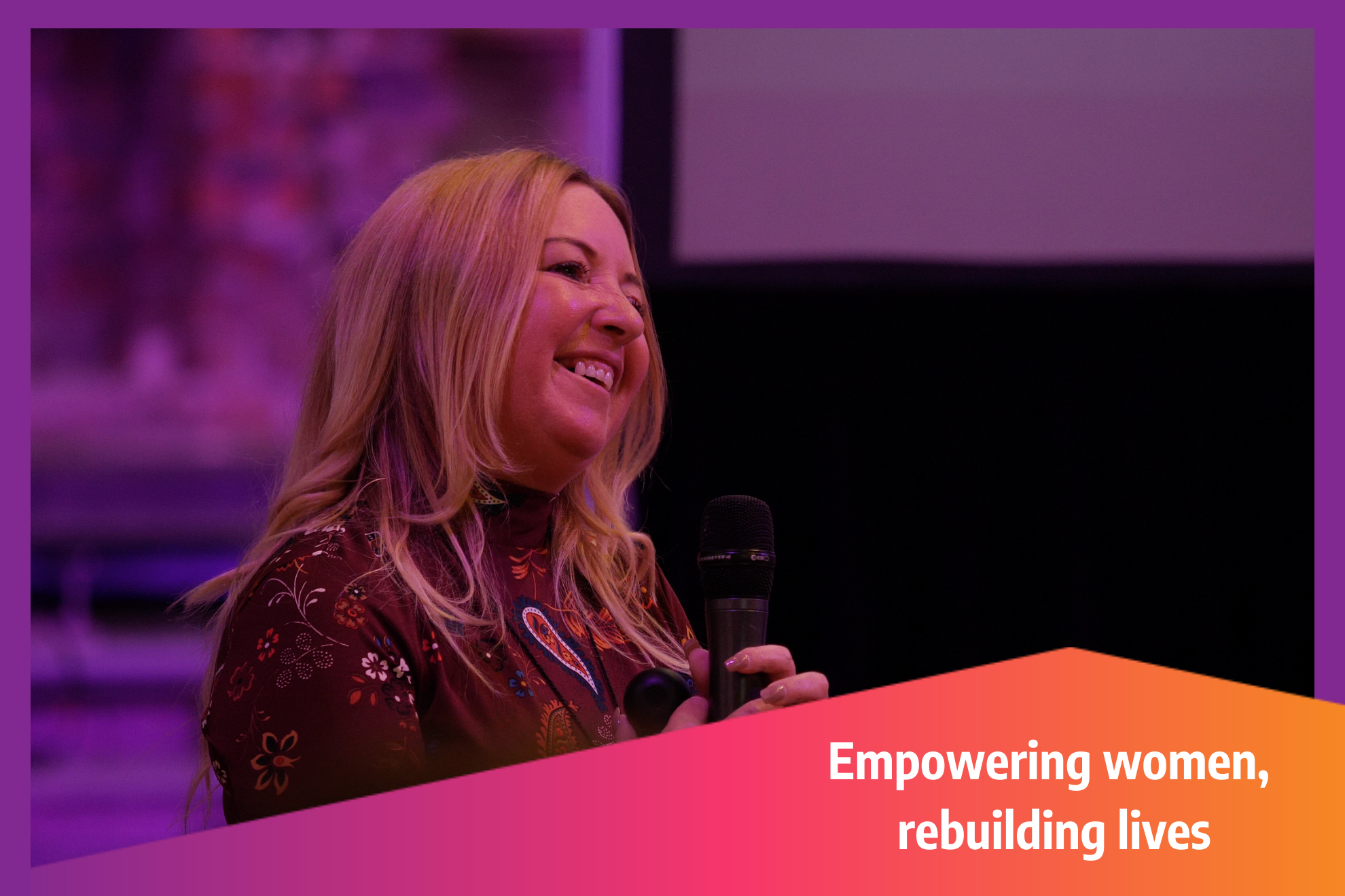 Image of a smiling lady. Text overlay reads, "Empowering Women, Rebuilding Lives."